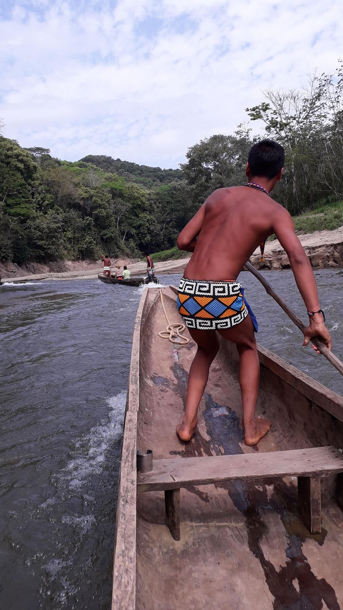 Emberá indigenous people in traditional clothing and jewelry